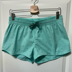 Never worn Patagonia shorts, aqua with blue stars